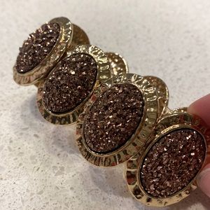 Mauve and gold thick stretchy bracelet.